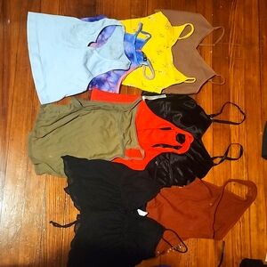 An assortment of 0 to 2 sized crop tops. Mostly brand new.